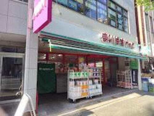 ローソンストア100高円寺南店まで185m 私たちは、　”みんなと暮らすマチ”を幸せにします。