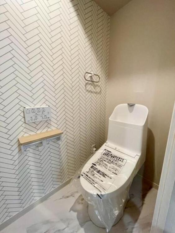 トイレ 毎日使うトイレは落ち着きと清潔感のあるデザイン 