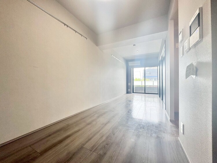 居間 忙しく過ぎゆく日常を置き去るほど、ゆったりした時間が流れるリビング。