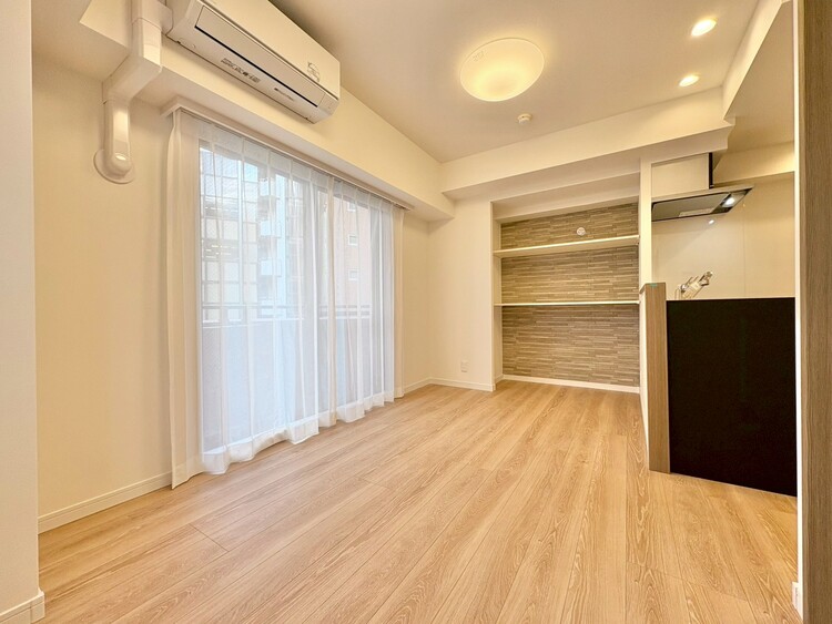 居間 忙しく過ぎゆく日常を置き去るほど、ゆったりした時間が流れるリビング。