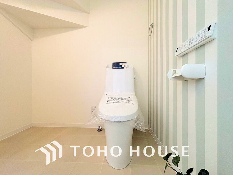 トイレ 白いクロスにより清潔感のあるトイレ