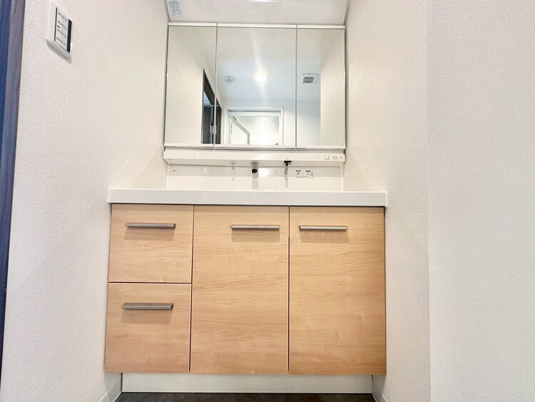 洗面 清潔感を感じられる洗面化粧台。