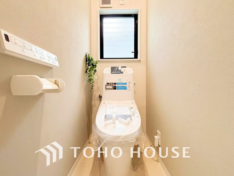 トイレ 白いクロスにより清潔感のあるトイレ