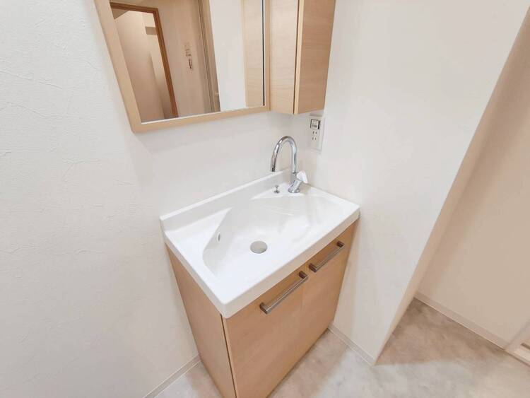 洗面 清潔感を感じられる洗面化粧台。