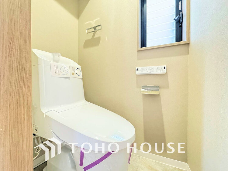 トイレ 白いクロスにより清潔感のあるトイレ