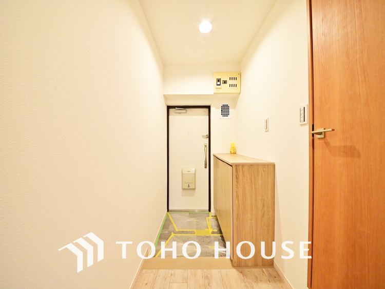 玄関 飾り過ぎないシンプルな内装の玄関