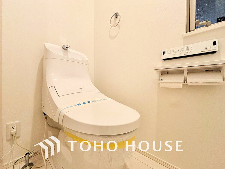 トイレ 白いクロスにより清潔感のあるトイレ