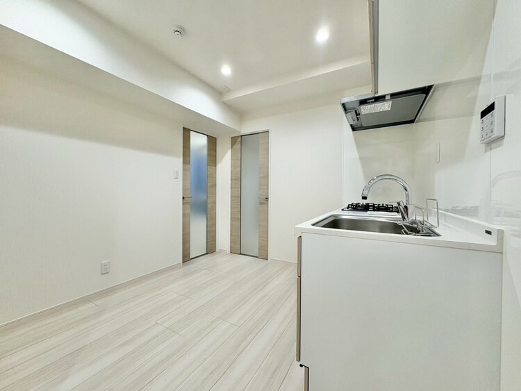 居間 忙しく過ぎゆく日常を置き去るほど、ゆったりした時間が流れるリビング。