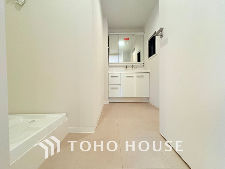 洗面 落ち着きのある色合いでまとめられた洗面室