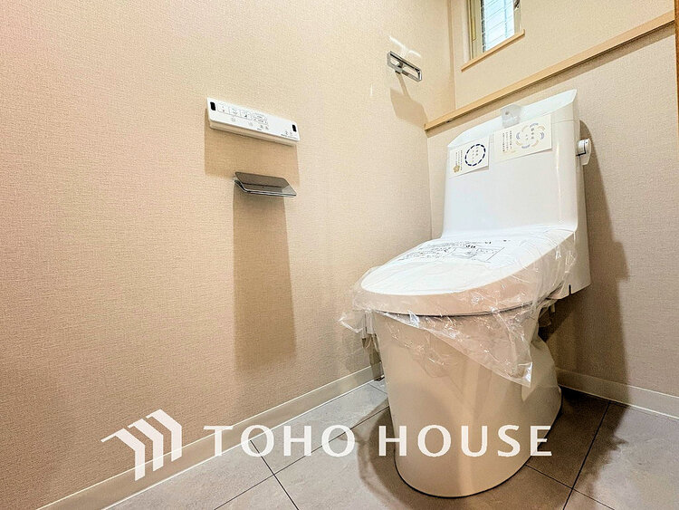 トイレ 白いクロスにより清潔感のあるトイレ