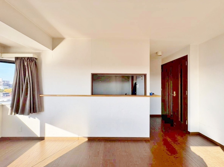 居間 忙しく過ぎゆく日常を置き去るほど、ゆったりした時間が流れるリビング。