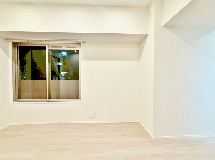 居間 忙しく過ぎゆく日常を置き去るほど、ゆったりした時間が流れるリビング。