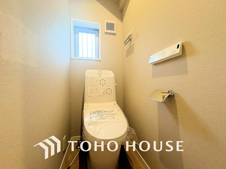 トイレ 白いクロスにより清潔感のあるトイレ