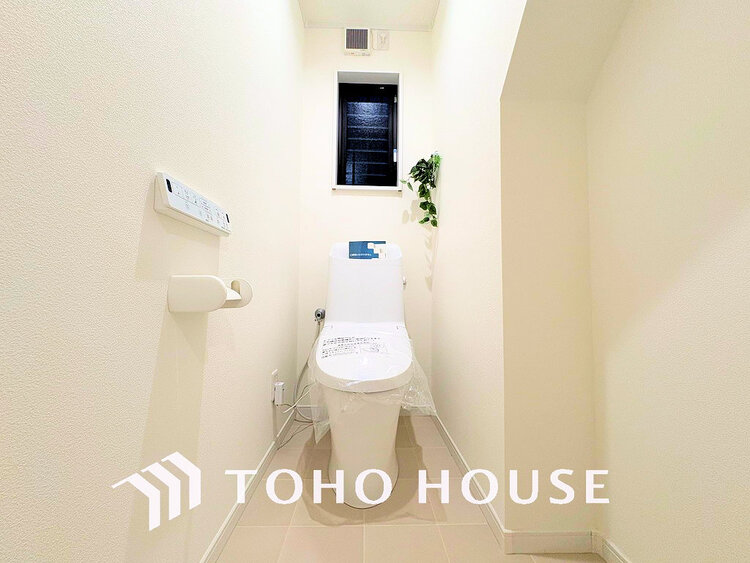 トイレ 白いクロスにより清潔感のあるトイレ