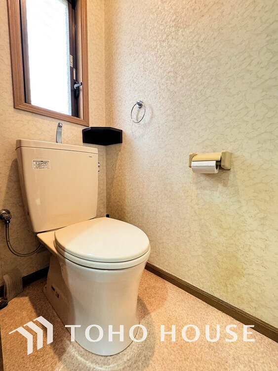 トイレ 白いクロスにより清潔感のあるトイレ