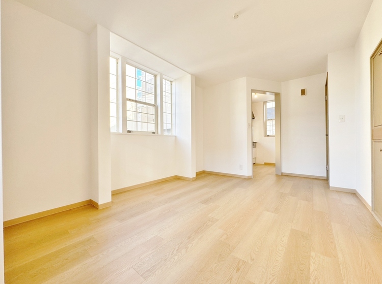 居間 忙しく過ぎゆく日常を置き去るほど、ゆったりした時間が流れるリビング。