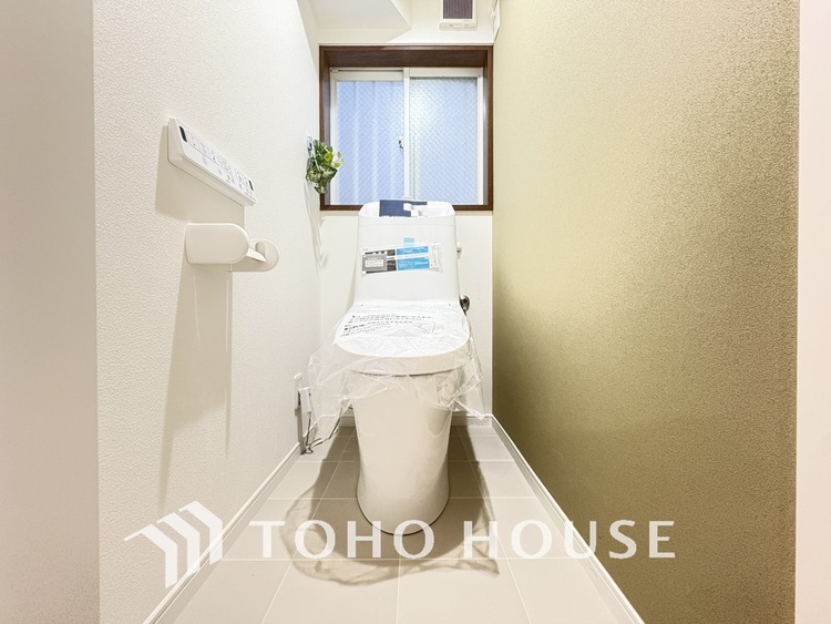 トイレ 白いクロスにより清潔感のあるトイレ