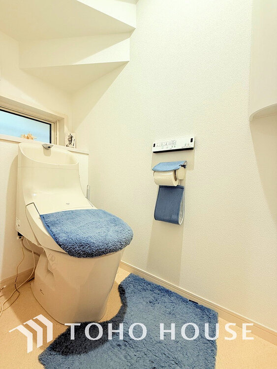 トイレ 白いクロスにより清潔感のあるトイレ