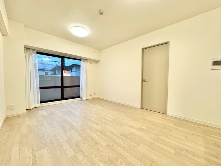 居間 忙しく過ぎゆく日常を置き去るほど、ゆったりした時間が流れるリビング。