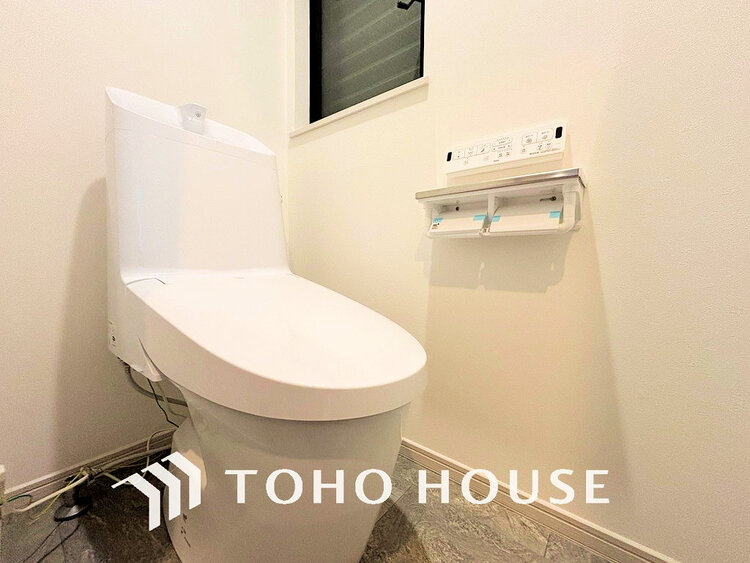 トイレ 白いクロスにより清潔感のあるトイレ