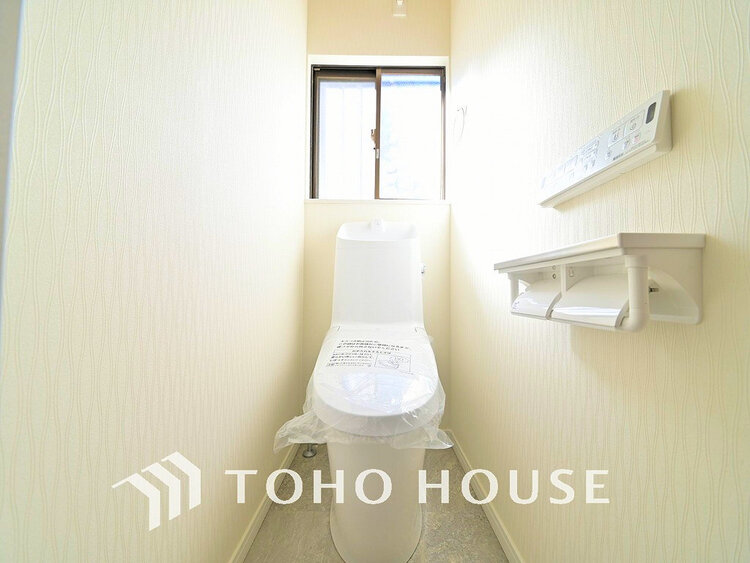 トイレ 白いクロスにより清潔感のあるトイレ