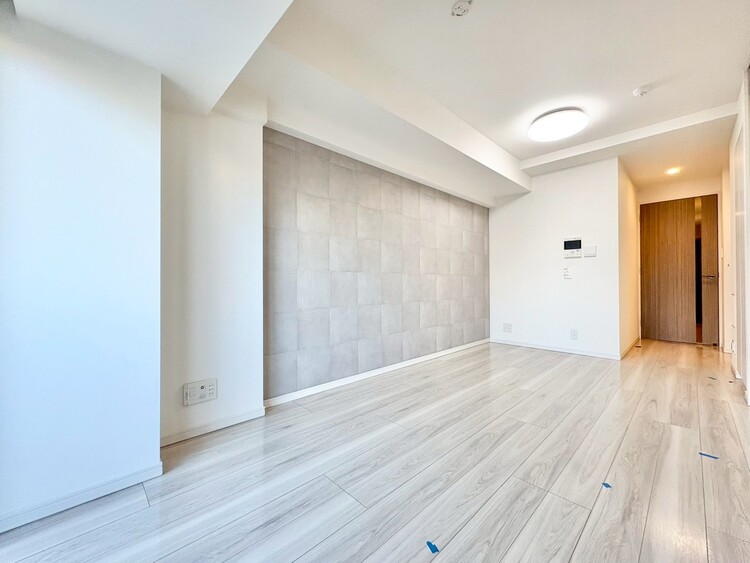 居間 忙しく過ぎゆく日常を置き去るほど、ゆったりした時間が流れるリビング。