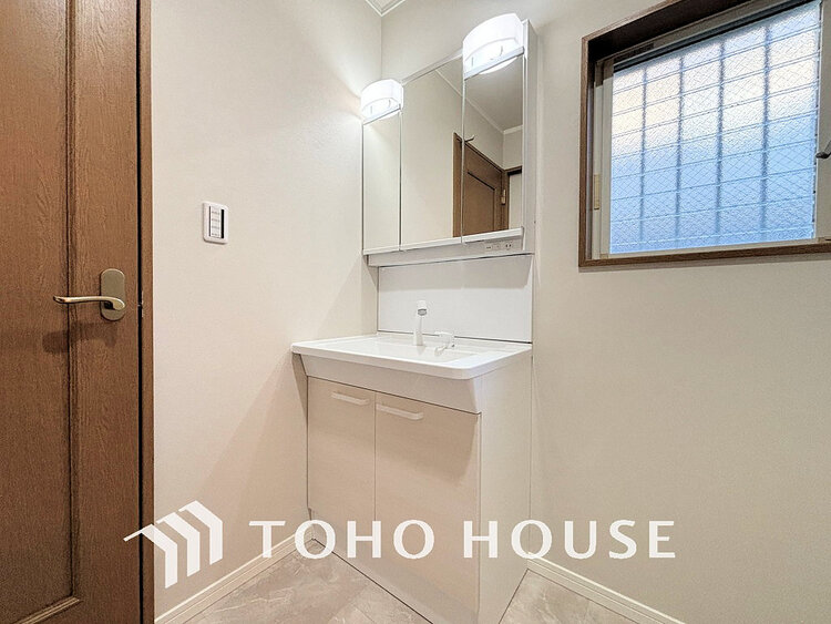 洗面 清潔感のある洗面室で朝の身支度を