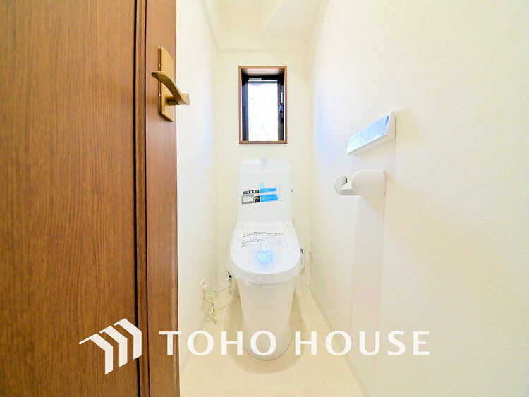 トイレ 白いクロスにより清潔感のあるトイレ