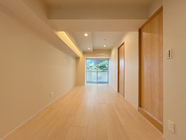 居間 忙しく過ぎゆく日常を置き去るほど、ゆったりした時間が流れるリビング。