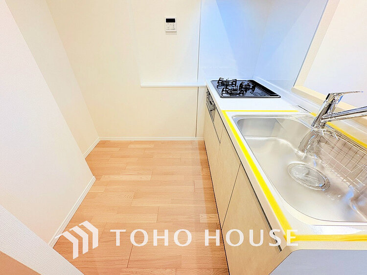 キッチン 落ち着きのあるカラーで統一された清潔感と気品が溢れるキッチン