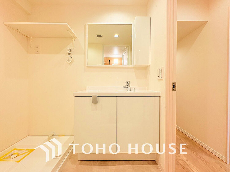 洗面 落ち着きのある色合いでまとめられた洗面室