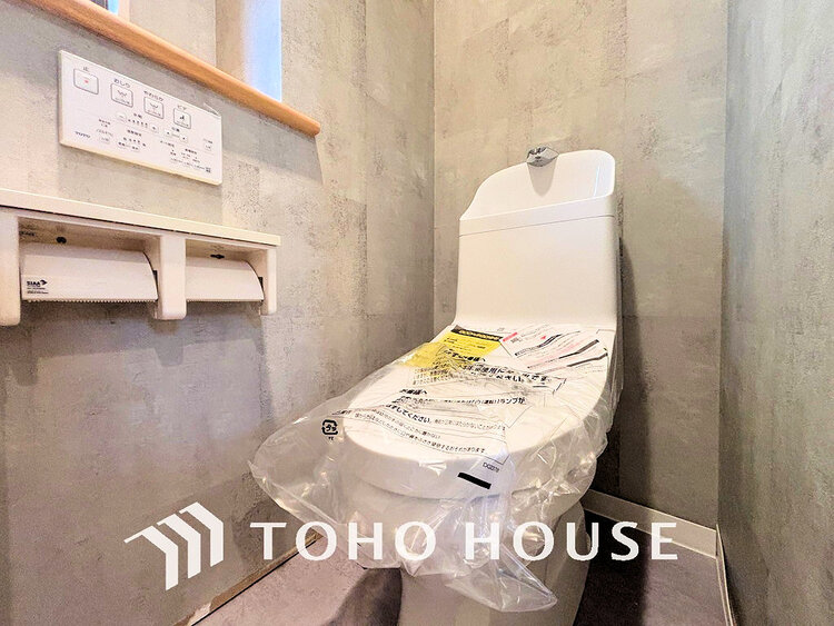 トイレ 白いクロスにより清潔感のあるトイレ