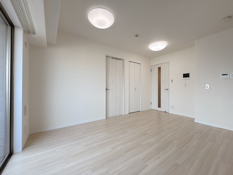 居間 忙しく過ぎゆく日常を置き去るほど、ゆったりした時間が流れるリビング。