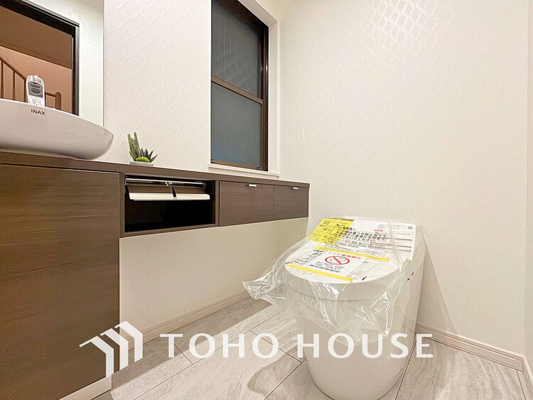 トイレ 白いクロスにより清潔感のあるトイレ