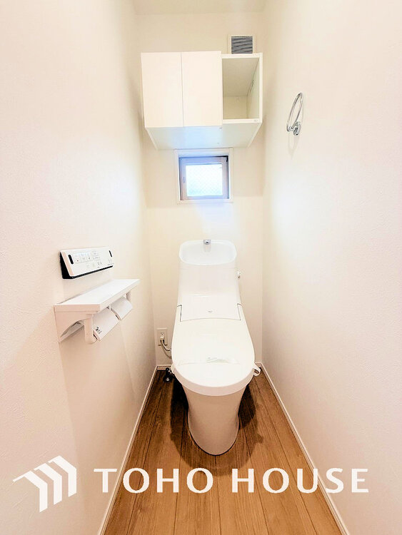 トイレ 白いクロスにより清潔感のあるトイレ