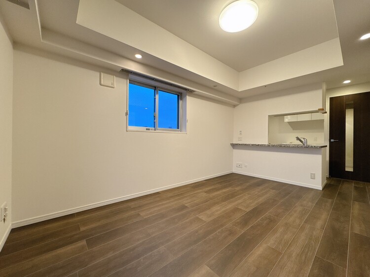 居間 忙しく過ぎゆく日常を置き去るほど、ゆったりした時間が流れるリビング。