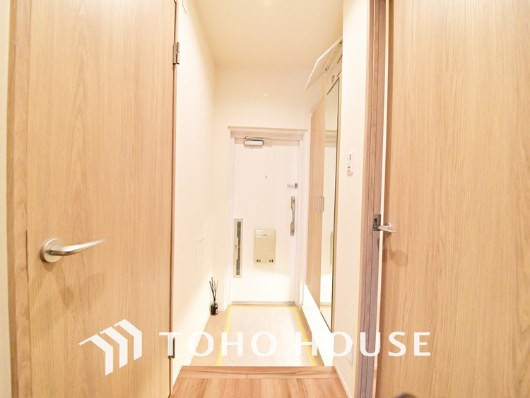 玄関 飾り過ぎないシンプルな内装の玄関