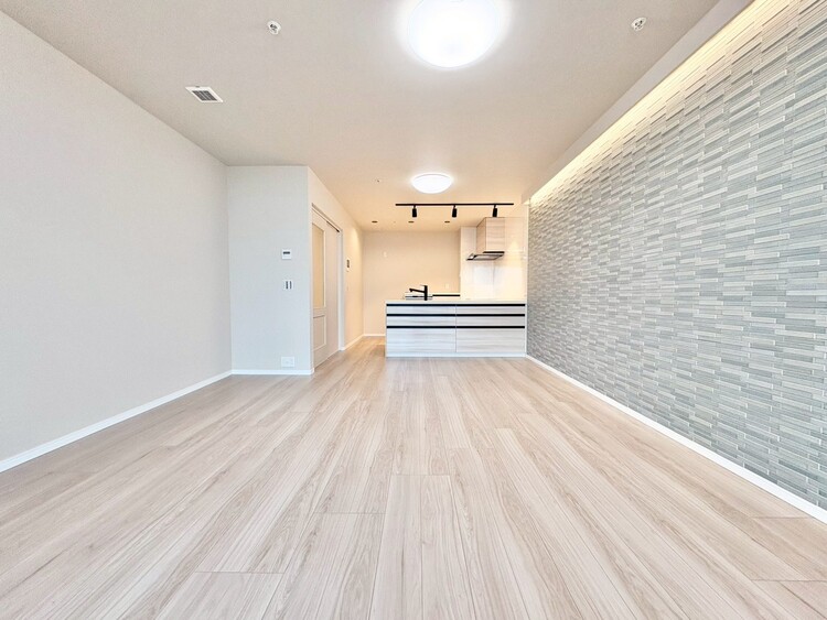 居間 忙しく過ぎゆく日常を置き去るほど、ゆったりした時間が流れるリビング。