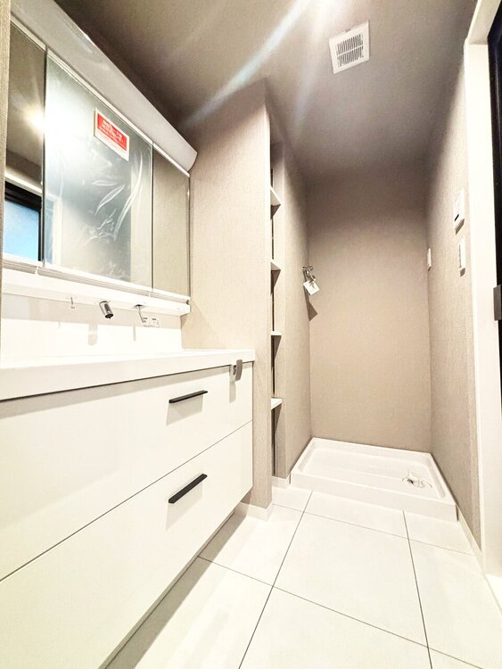 洗面 清潔感と心地よさを重視した、上質感漂うパウダールーム。