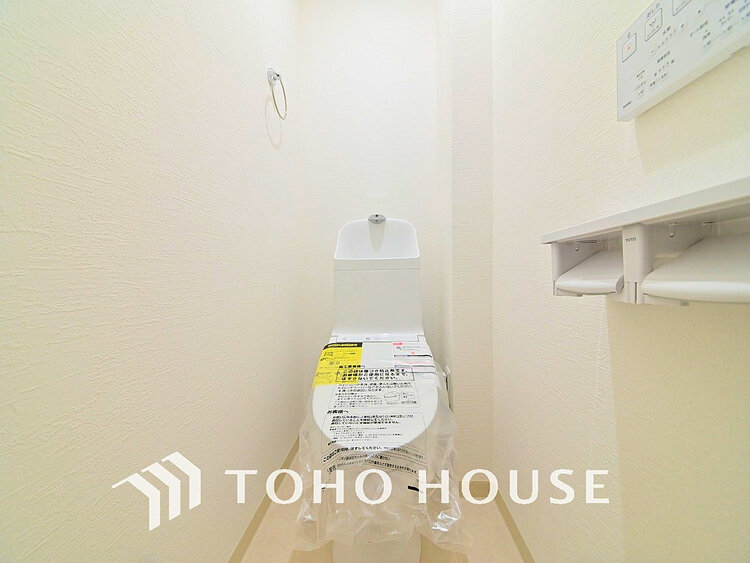 トイレ 白いクロスにより清潔感のあるトイレ