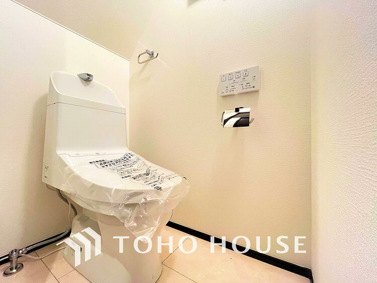 トイレ 白いクロスにより清潔感のあるトイレ