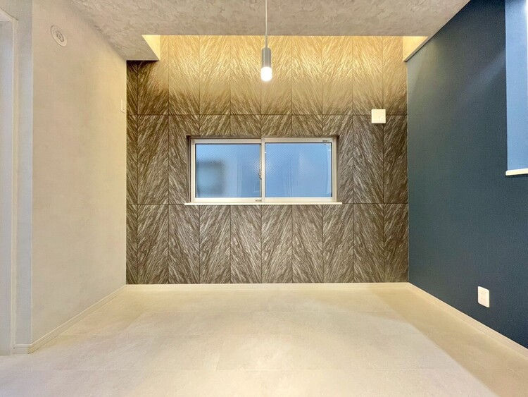 居間 忙しく過ぎゆく日常を置き去るほど、ゆったりした時間が流れるリビング。