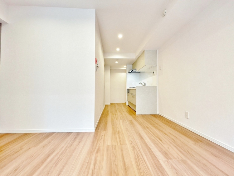 居間 忙しく過ぎゆく日常を置き去るほど、ゆったりした時間が流れるリビング。