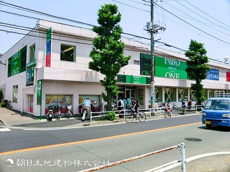 周辺 【フードワン田奈店】1020ｍ　田奈駅から徒歩圏内の好アクセスながら、無料大型駐車場を完備。豊富な品揃えとリーズナブルな価格、便利なテナントも揃う地域密着型のスーパーです。